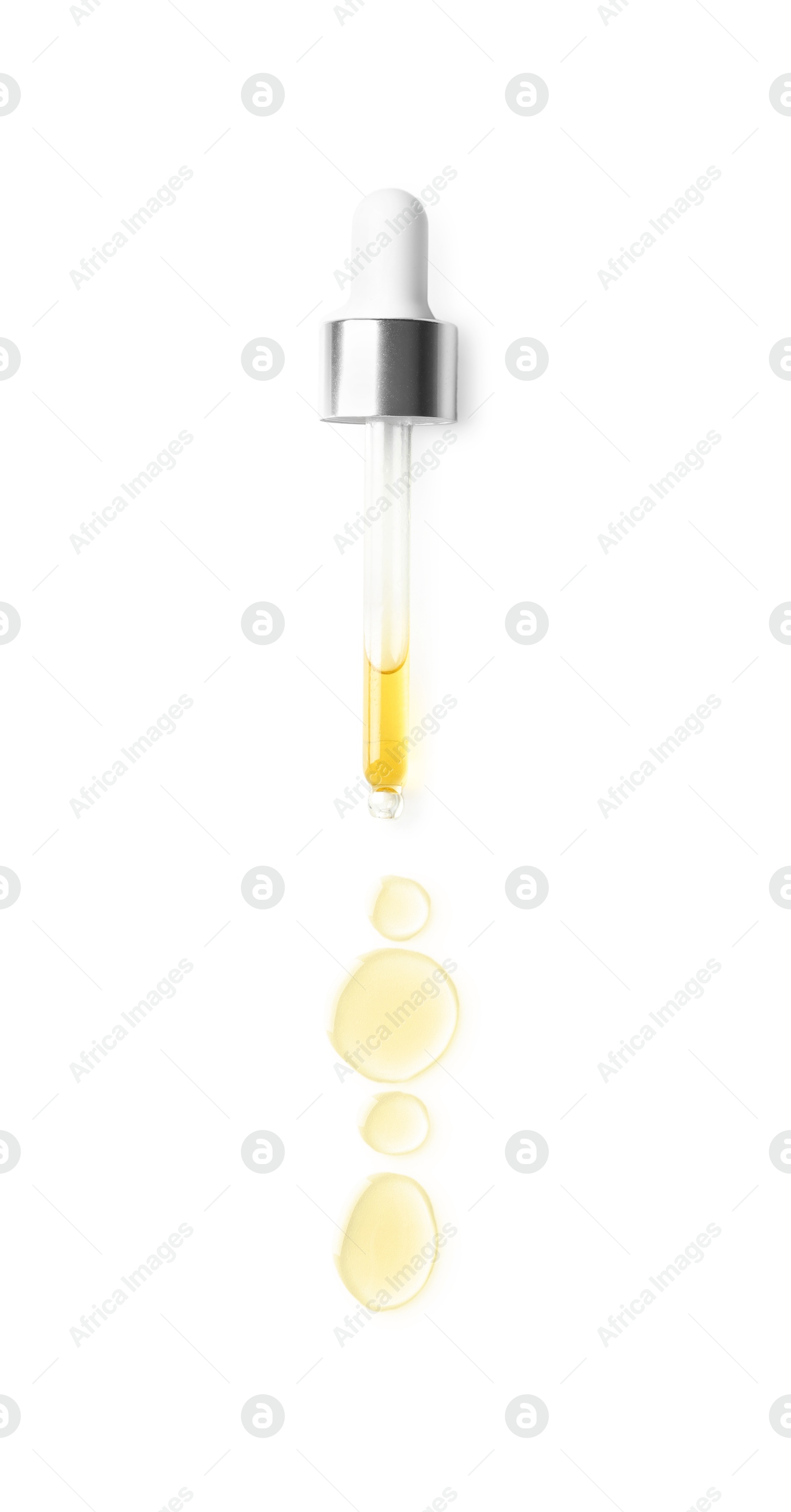 Photo of Cosmetic oil and pipette isolated on white, top view