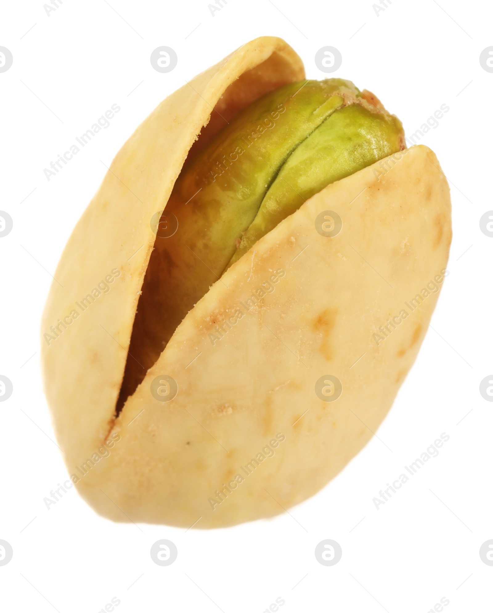 Photo of One tasty pistachio nut isolated on white