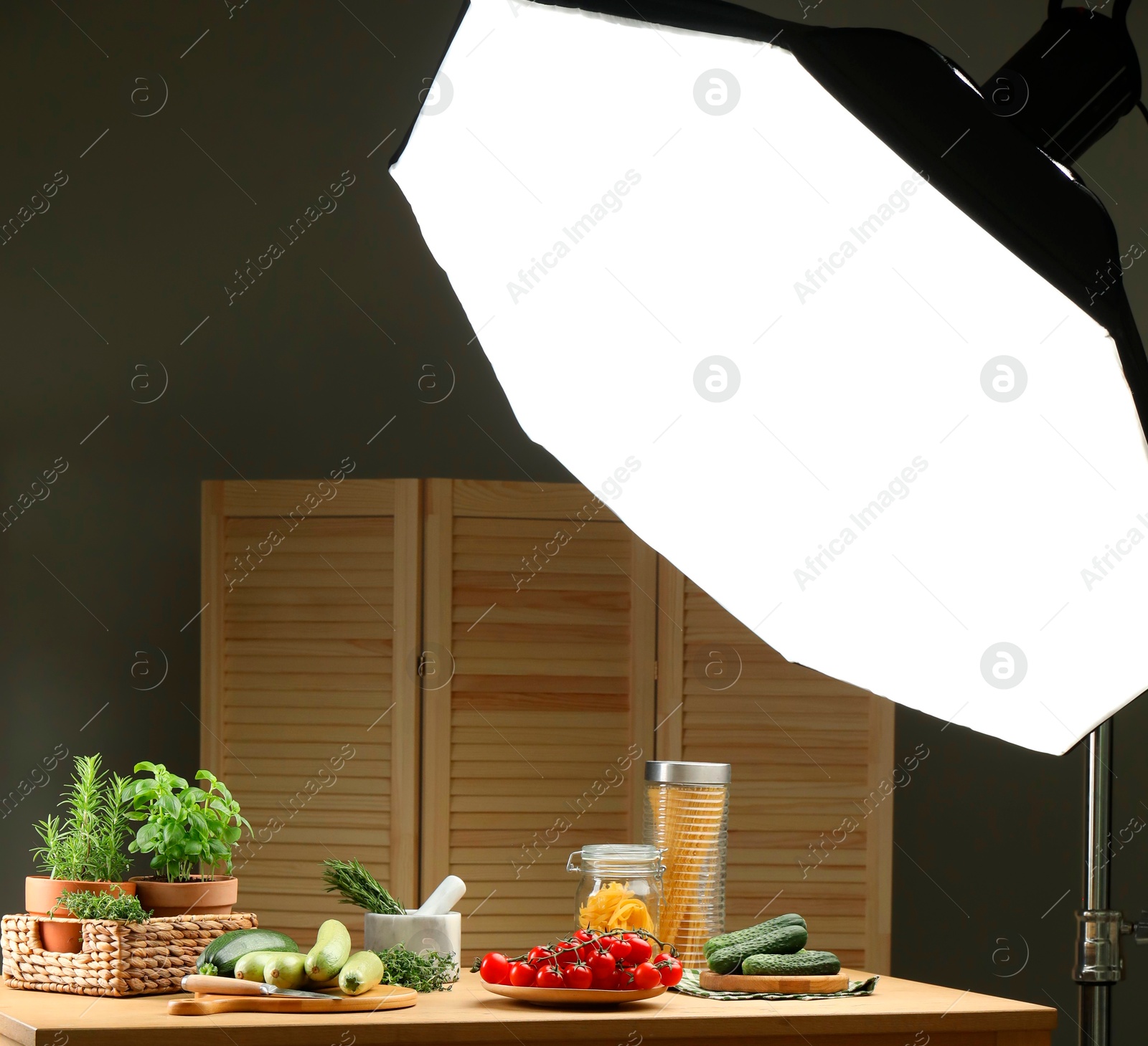 Photo of Shooting food in photo studio with professional lighting equipment