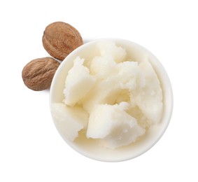 Photo of Natural shea butter in bowl and nuts isolated on white, top view