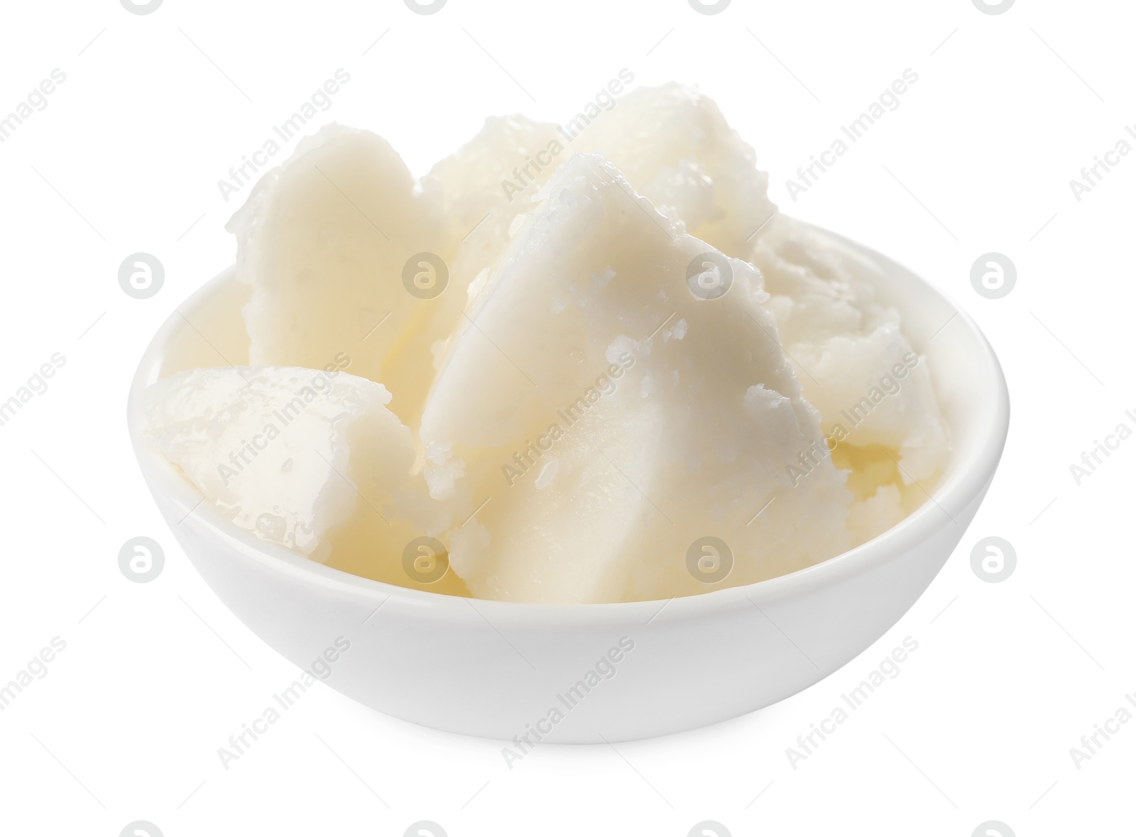 Photo of Natural shea butter in bowl isolated on white