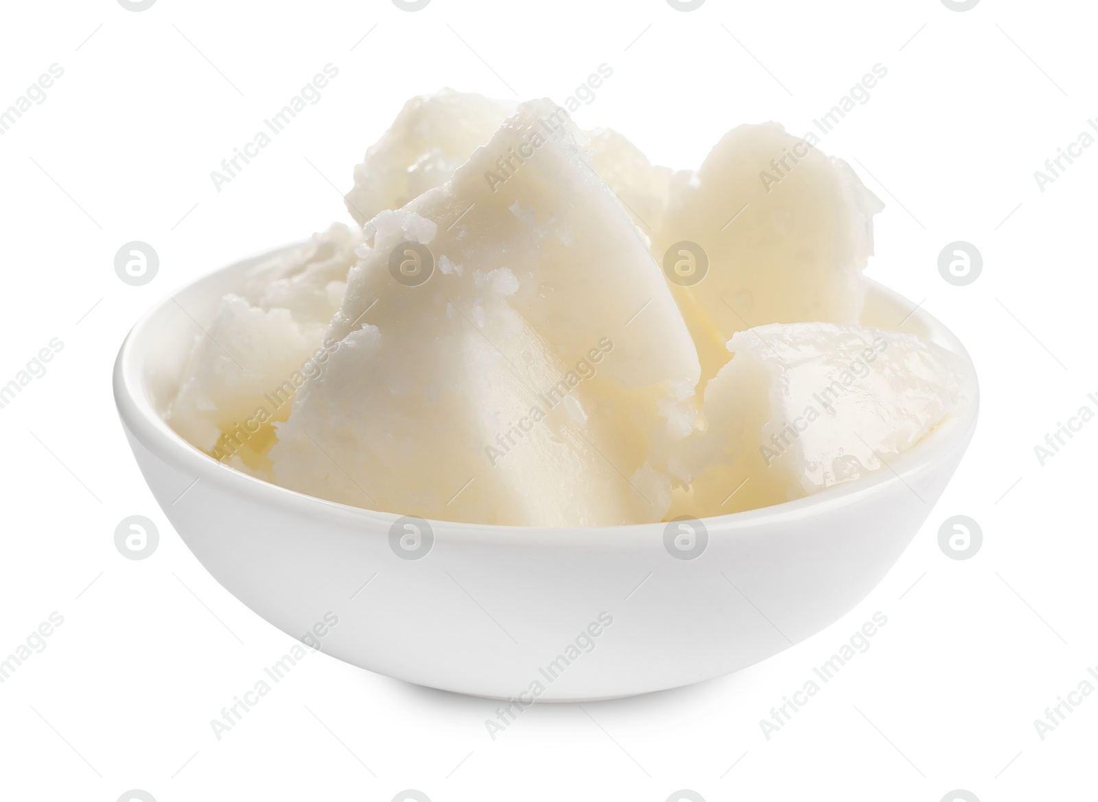 Photo of Natural shea butter in bowl isolated on white