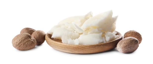 Photo of Natural shea butter and nuts isolated on white