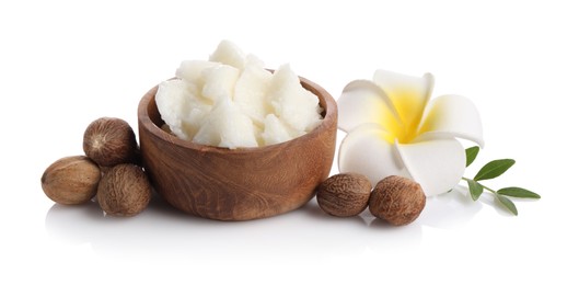 Photo of Natural shea butter, nuts and plumeria flower isolated on white