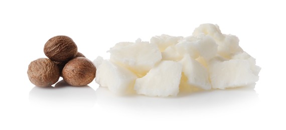 Natural shea butter and nuts isolated on white