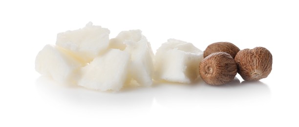 Natural shea butter and nuts isolated on white