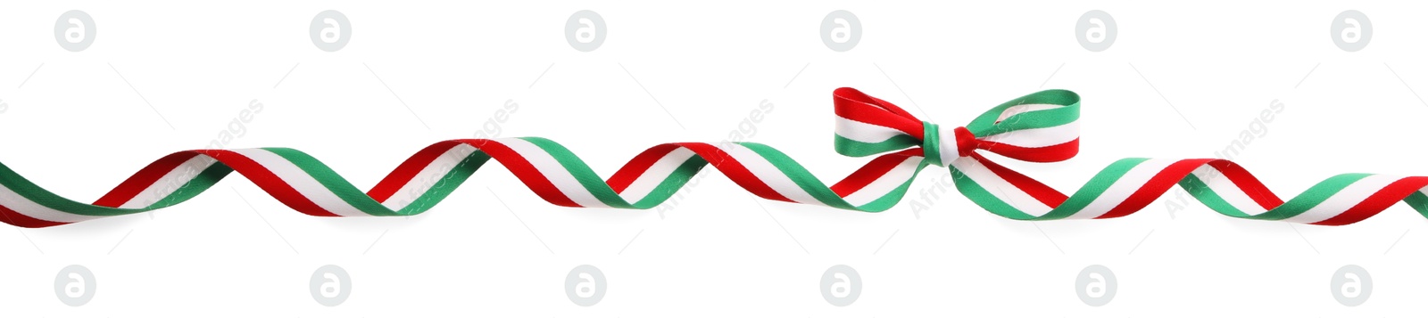 Photo of Ribbon bow with Hungary flag pattern isolated on white, top view