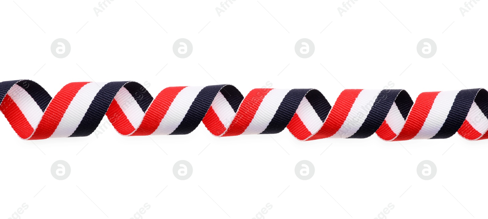 Photo of Ribbon in colors of Yemeni flag isolated on white, top view