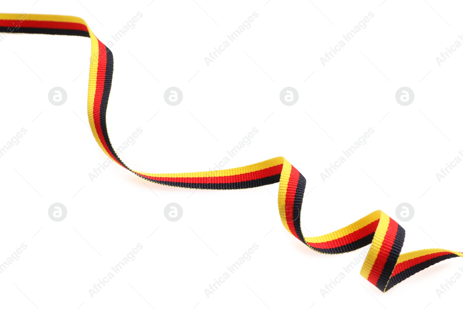 Photo of Ribbon in colors of German flag isolated on white