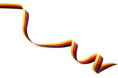 Photo of Ribbon in colors of German flag isolated on white