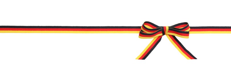 Ribbon with bow in colors of German flag isolated on white, top view