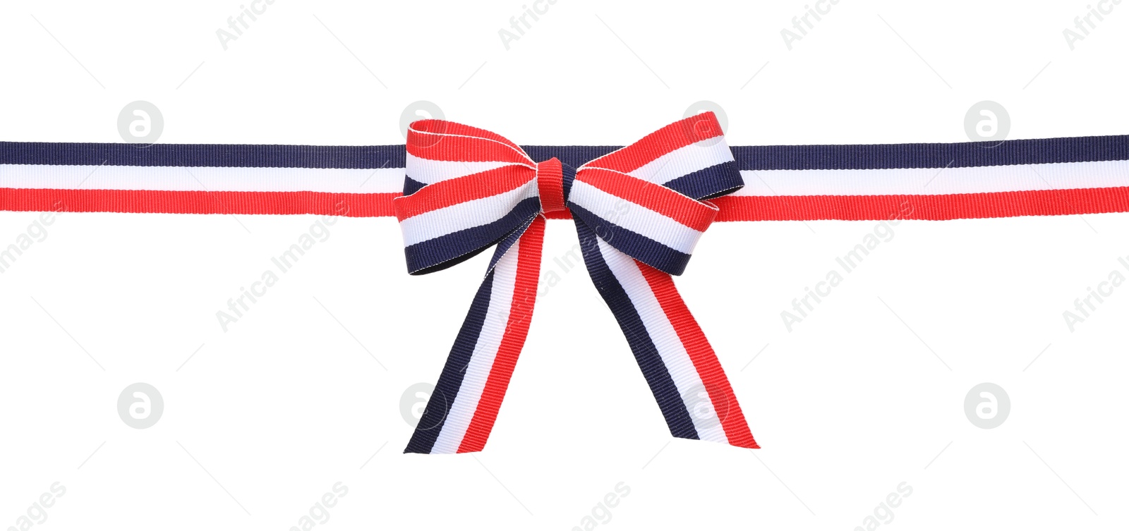 Photo of Ribbon with bow in colors of Yemeni flag isolated on white, top view