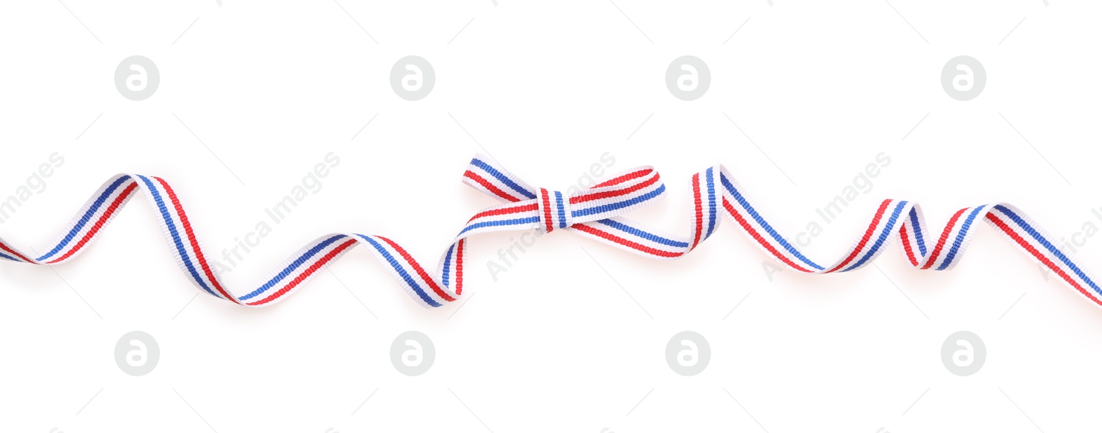 Photo of Ribbon with bow in colors of Netherlands flag isolated on white, top view