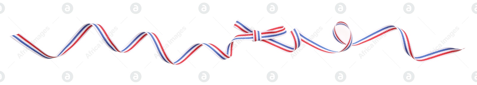 Photo of Ribbon with bow in colors of Netherlands flag isolated on white, top view