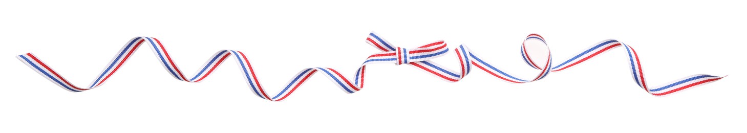 Photo of Ribbon with bow in colors of Netherlands flag isolated on white, top view