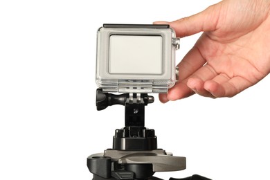 Woman with modern action camera on white background