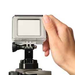 Woman with modern action camera on white background