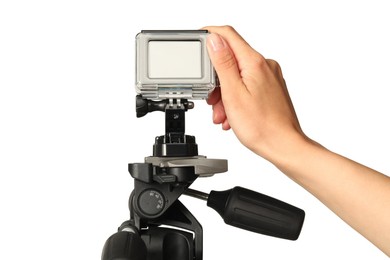 Woman with modern action camera on white background