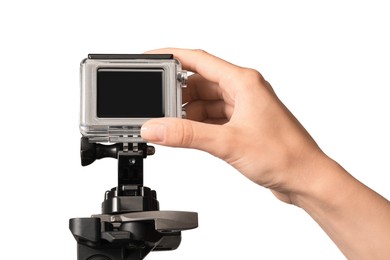 Woman with modern action camera on white background