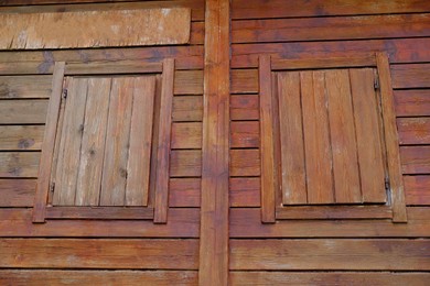 Photo of Beautiful wooden building with closed windows outdoors