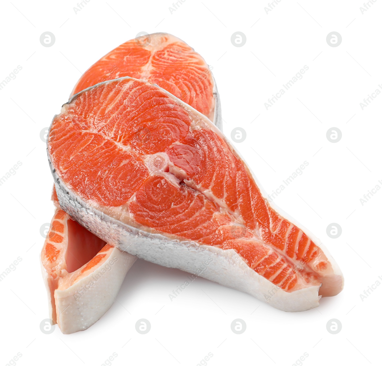 Photo of Two fresh salmon steaks isolated on white