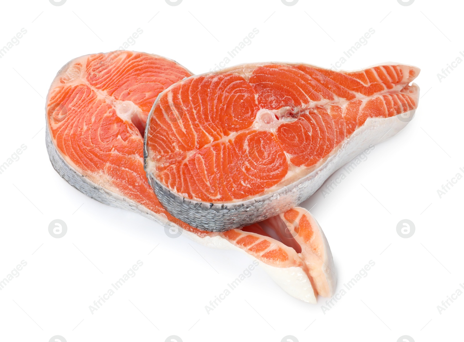 Photo of Two fresh salmon steaks isolated on white, above view