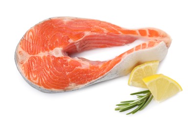 Photo of Fresh salmon steak, lemon and rosemary isolated on white, top view