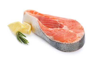 Photo of Fresh salmon steak, lemon and rosemary isolated on white