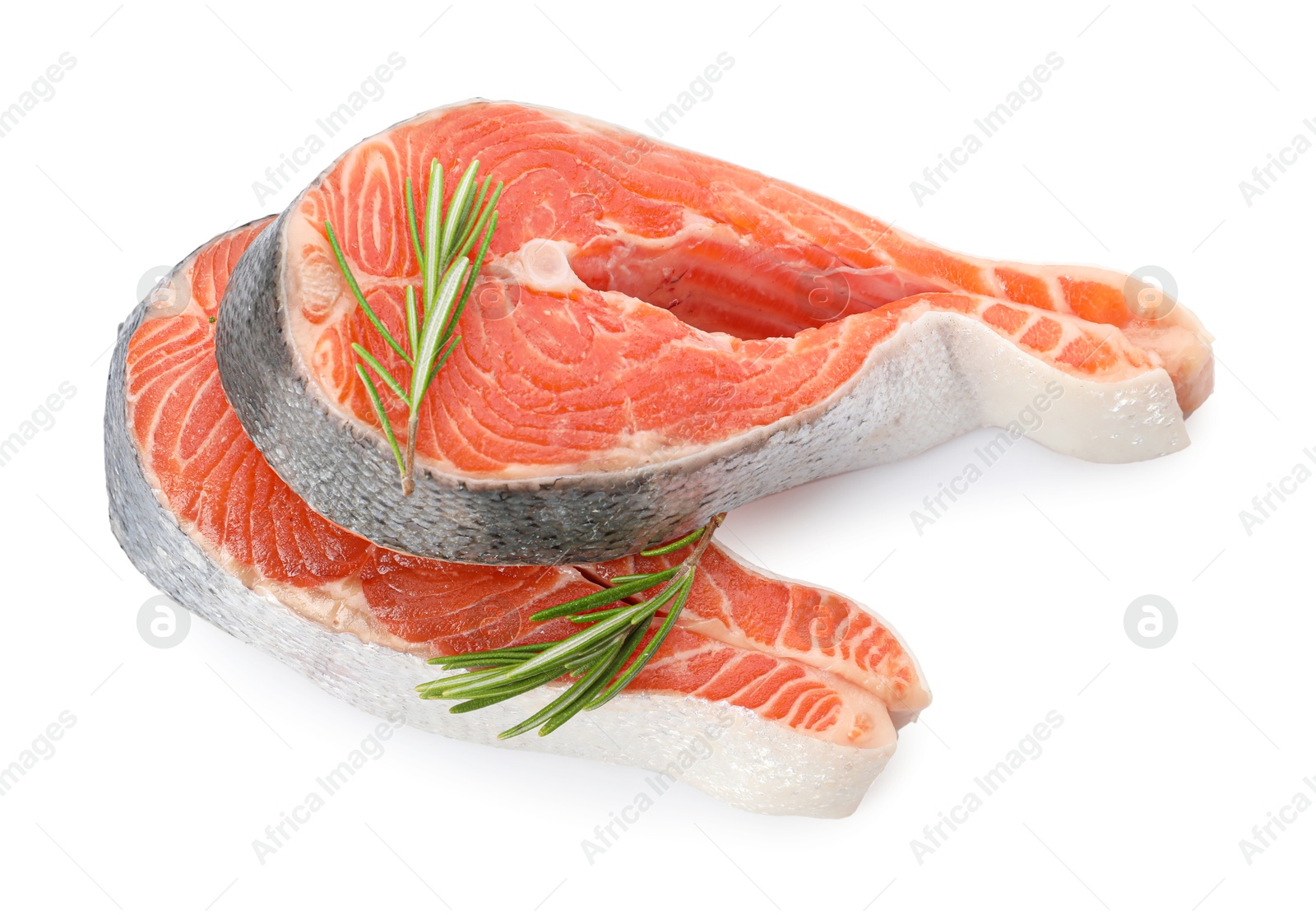 Photo of Two fresh salmon steaks and rosemary isolated on white, above view