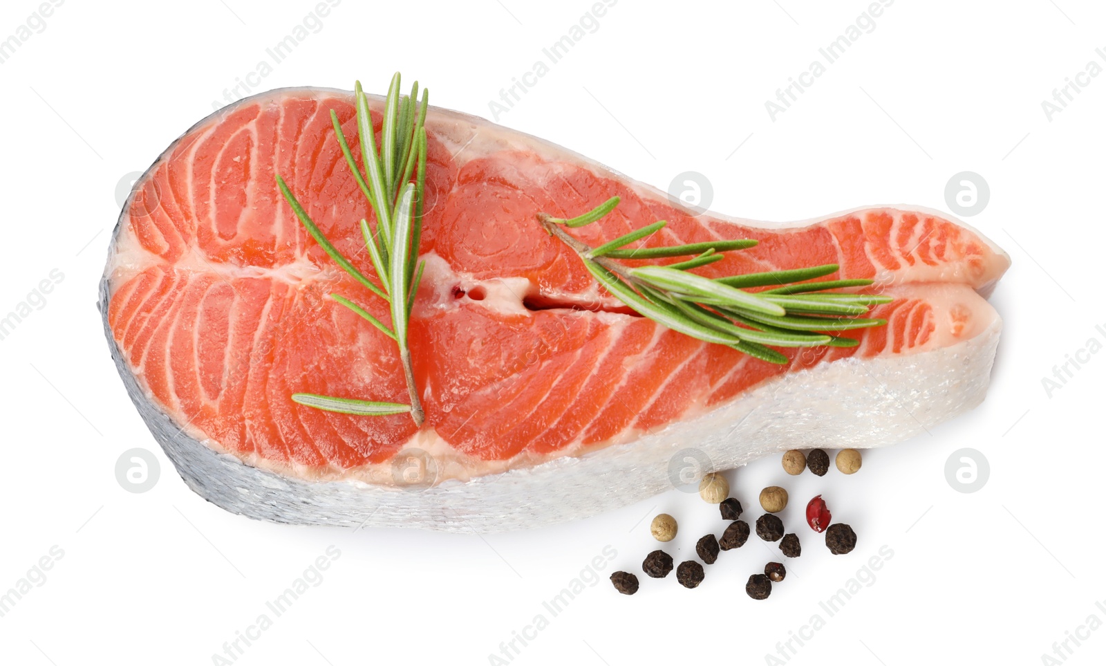 Photo of Fresh salmon steak, peppercorns and rosemary isolated on white, above view