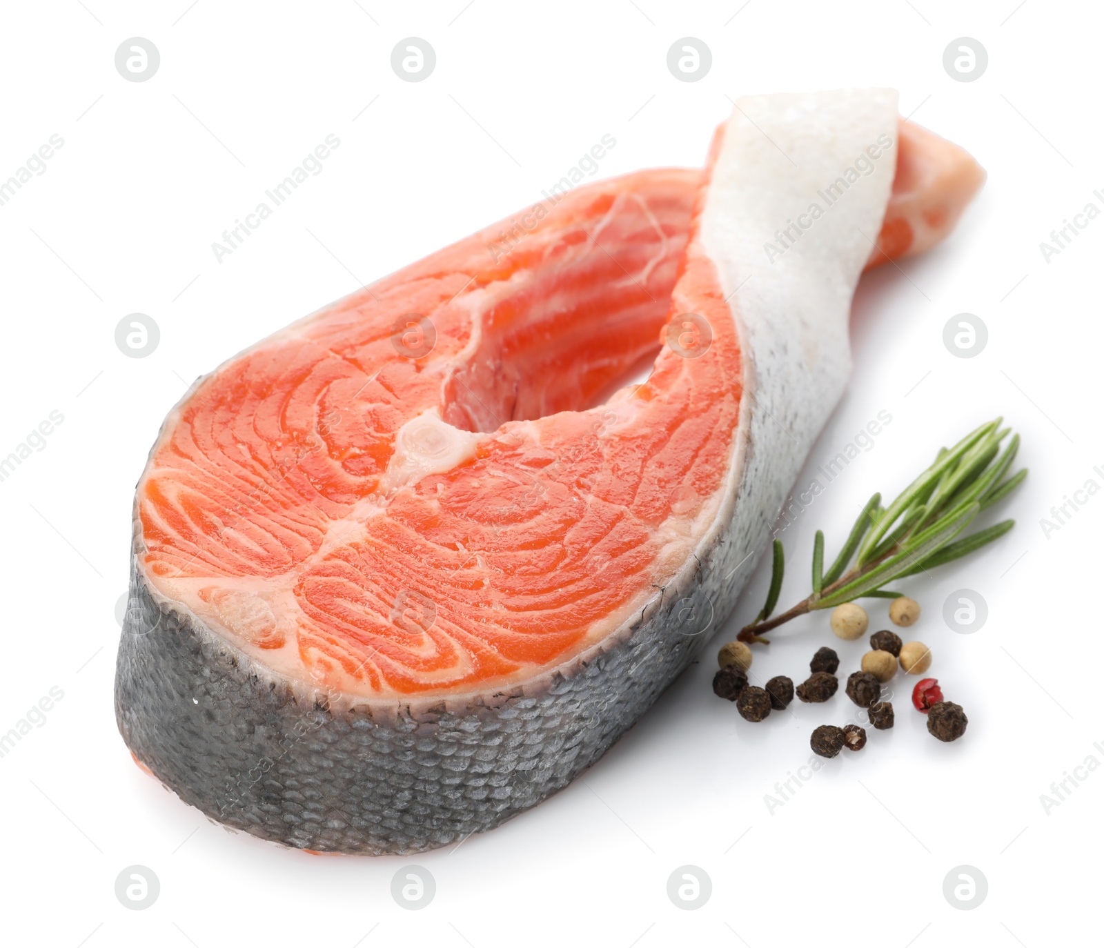 Photo of Fresh salmon steak, peppercorns and rosemary isolated on white