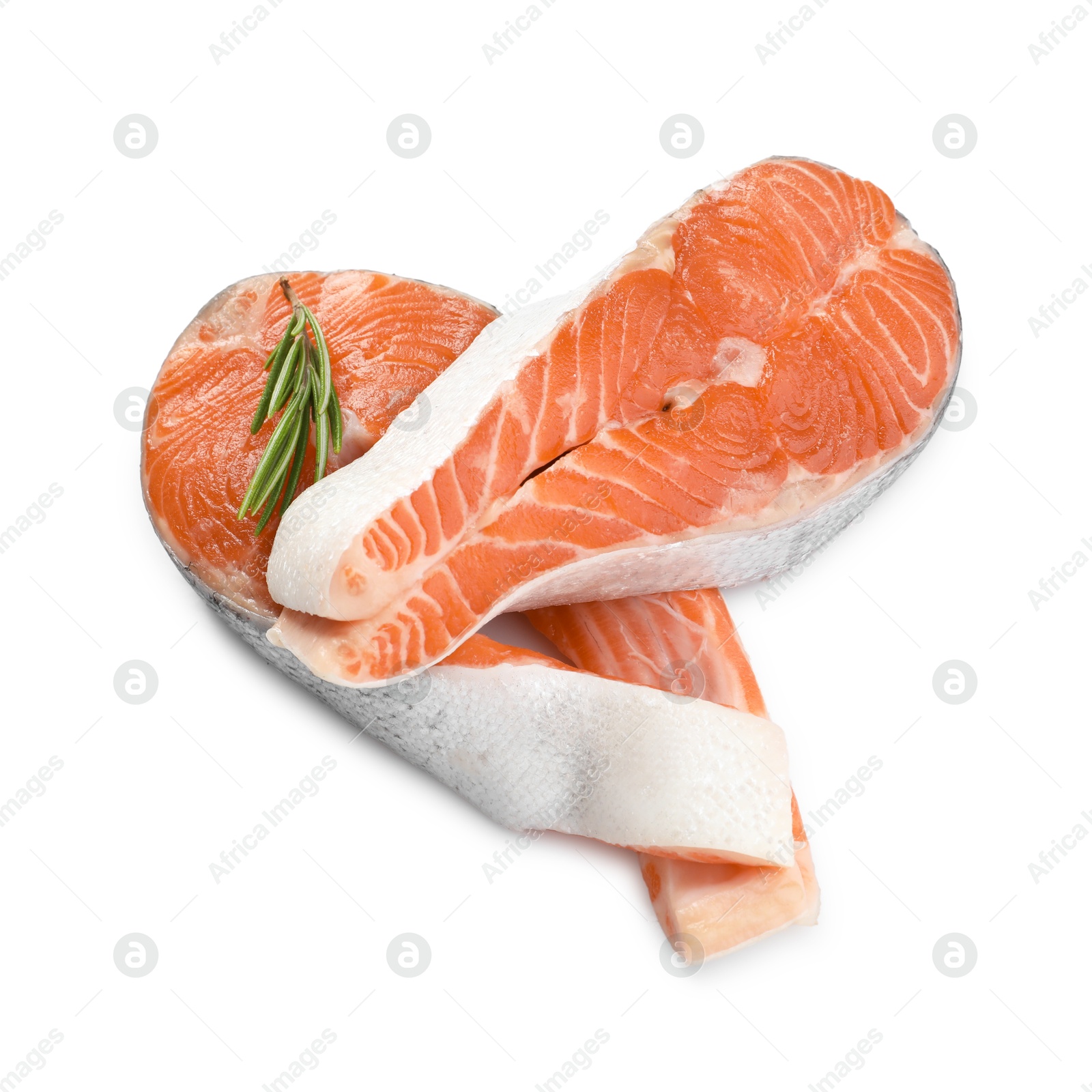 Photo of Two fresh salmon steaks and rosemary isolated on white, above view