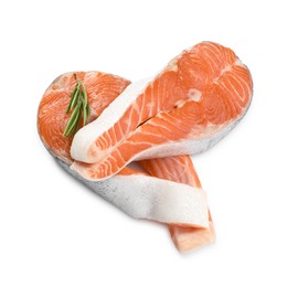 Photo of Two fresh salmon steaks and rosemary isolated on white, above view