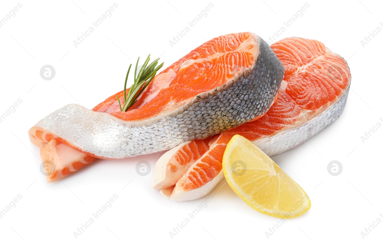 Photo of Two fresh salmon steaks, lemon and rosemary isolated on white