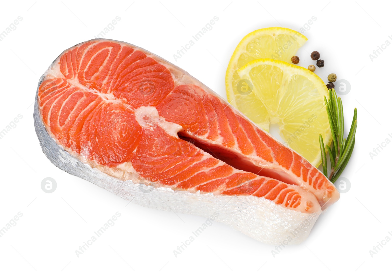 Photo of Fresh salmon steak, lemon, peppercorns and rosemary isolated on white, above view