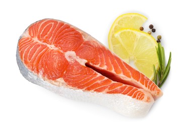 Fresh salmon steak, lemon, peppercorns and rosemary isolated on white, above view