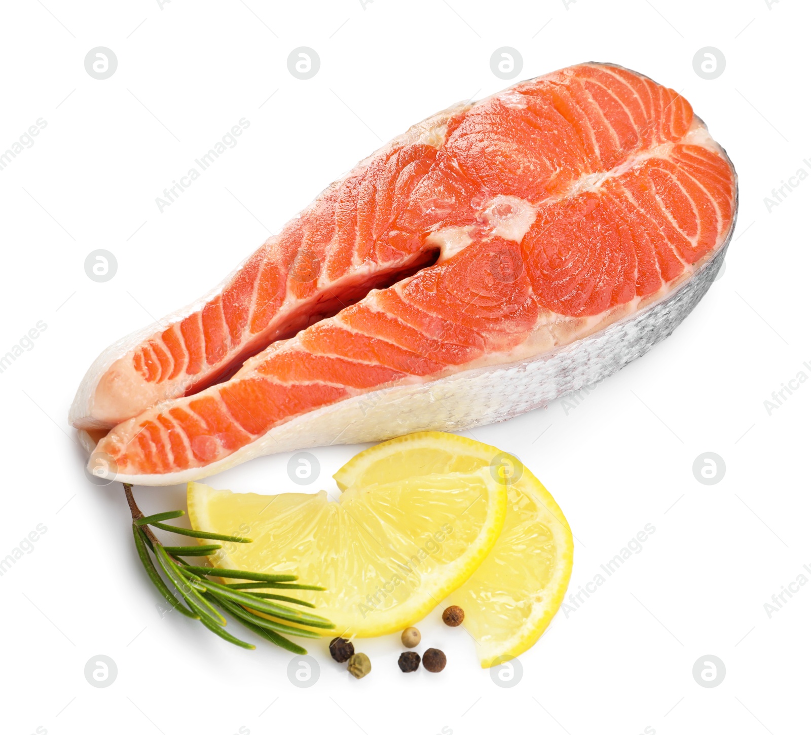 Photo of Fresh salmon steak, lemon, peppercorns and rosemary isolated on white, above view