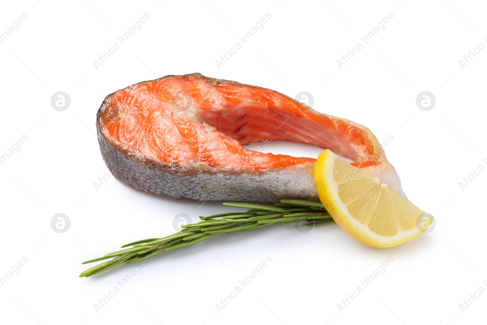 Photo of Tasty grilled salmon steak, lemon and rosemary isolated on white