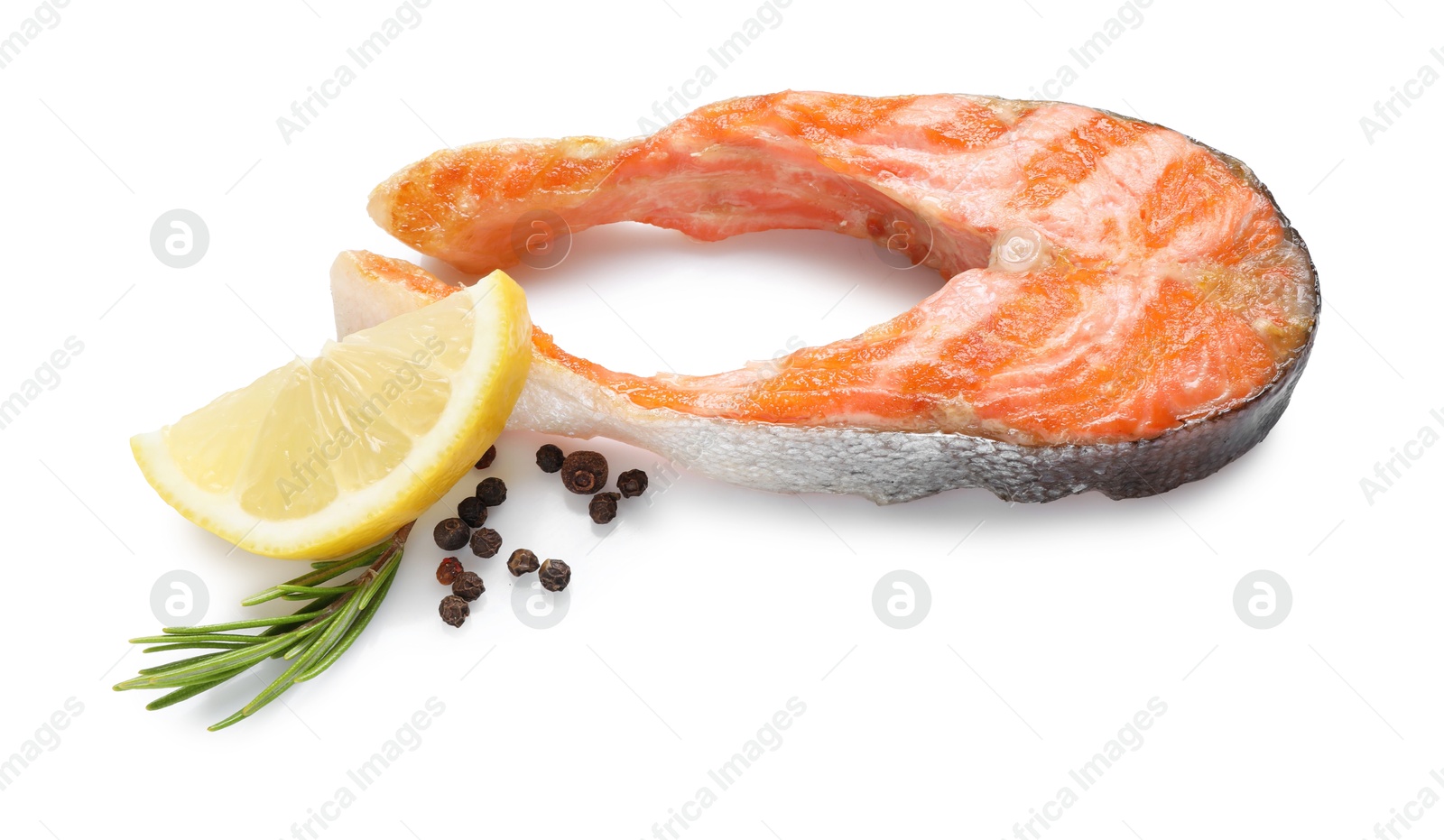 Photo of Tasty grilled salmon steak, lemon and spices isolated on white