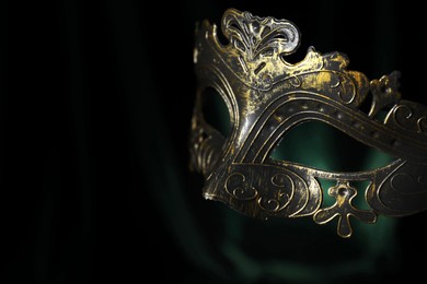 Beautiful carnival mask on black background, closeup. Space for text