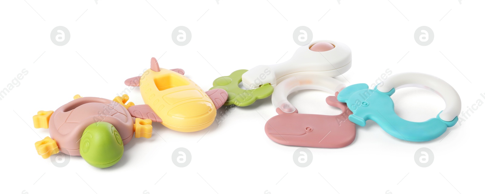 Photo of Colorful rattles isolated on white. Baby accessories