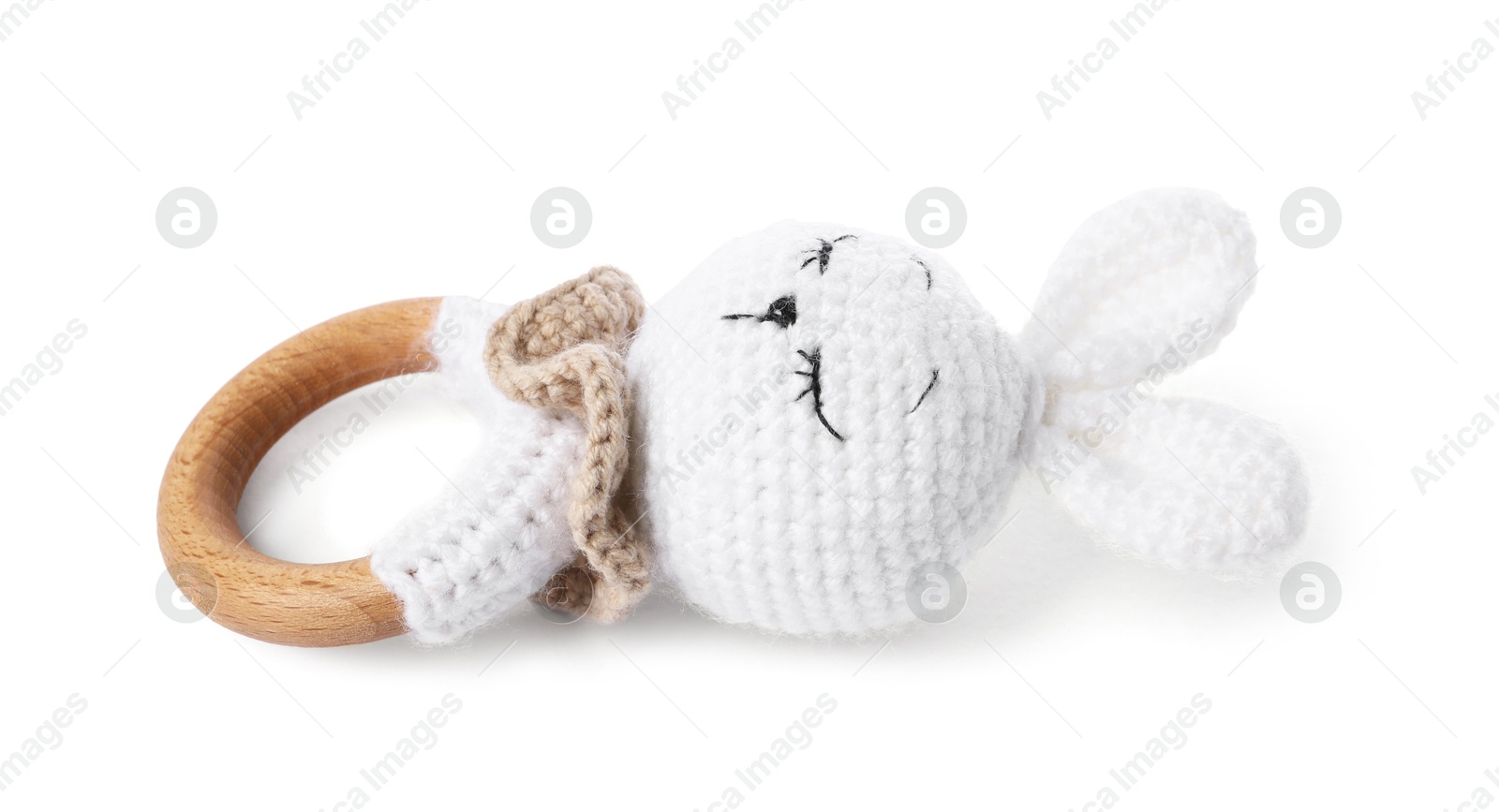 Photo of Wooden rattle isolated on white. Baby accessory