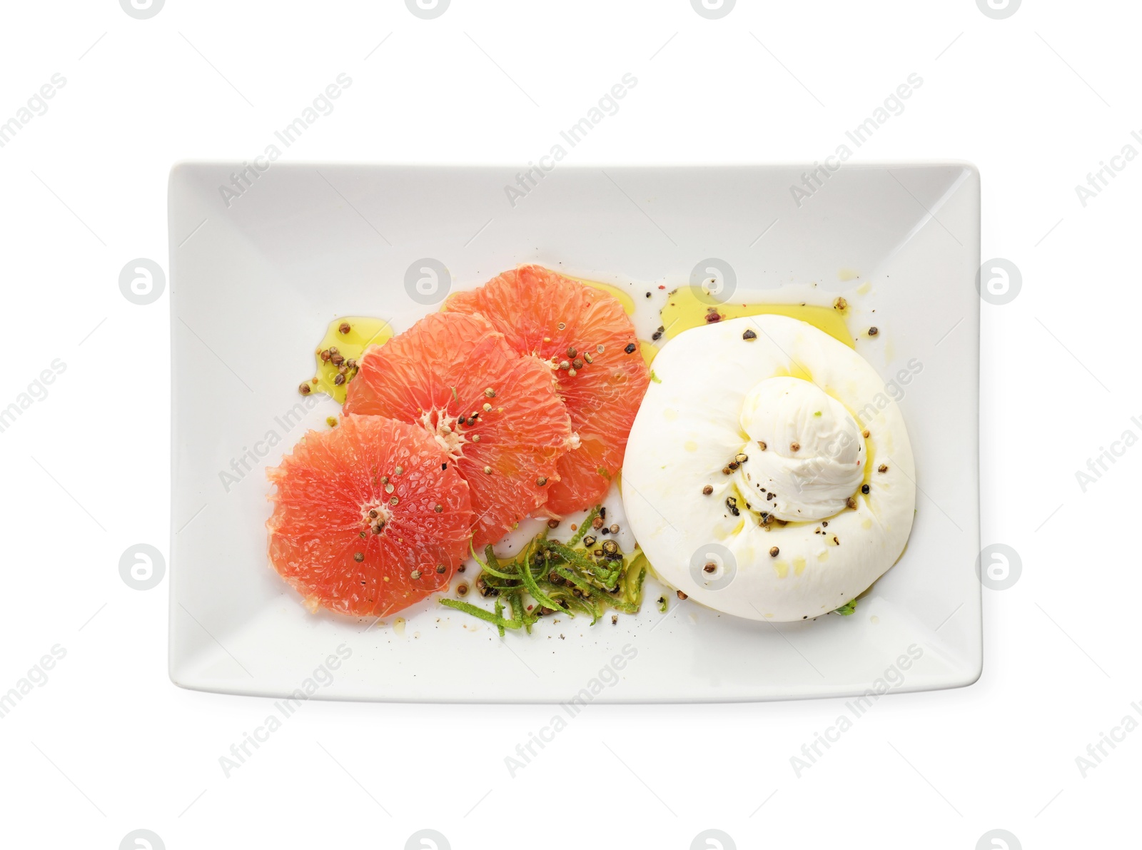 Photo of Delicious burrata cheese, grapefruit and spices isolated on white, top view