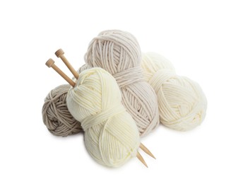 Photo of Skeins of soft yarn and knitting needles isolated on white