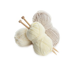 Photo of Skeins of soft yarn and knitting needles isolated on white