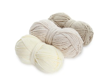 Photo of Skeins of soft yarn for knitting isolated on white