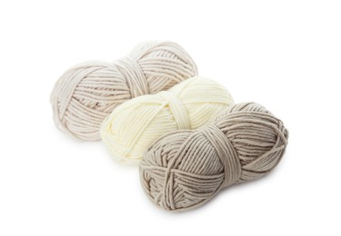 Photo of Skeins of soft yarn for knitting isolated on white