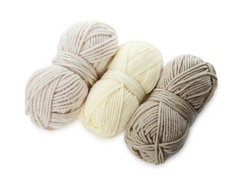 Skeins of soft yarn for knitting isolated on white, top view