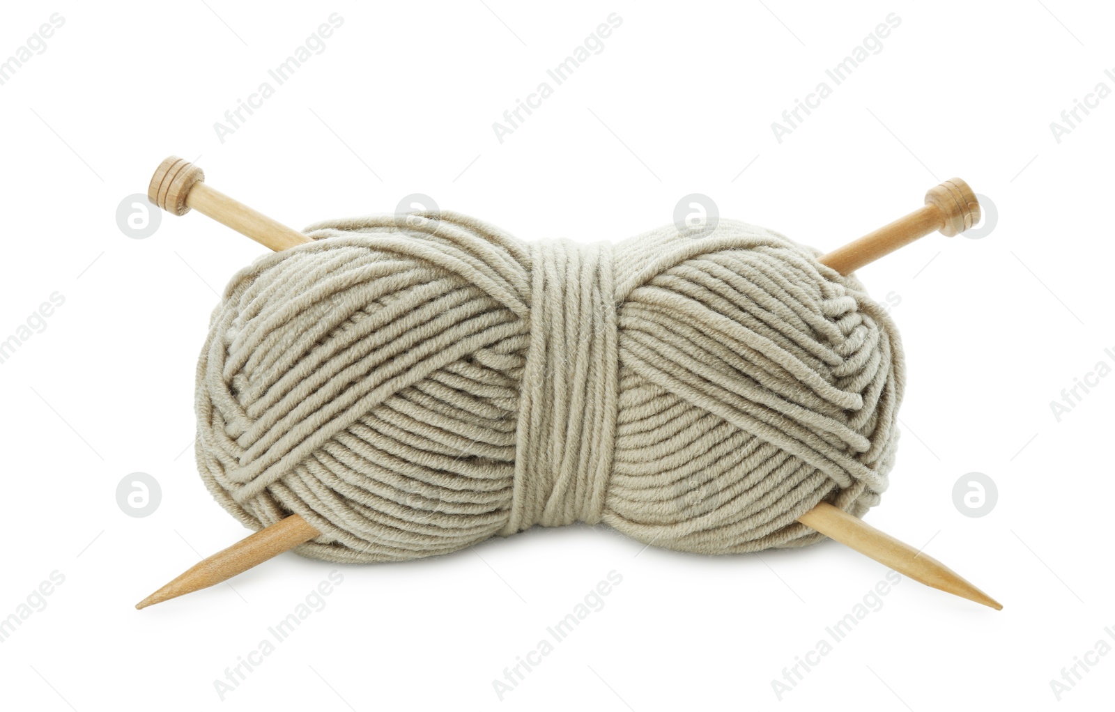 Photo of Skein of soft yarn and knitting needles isolated on white