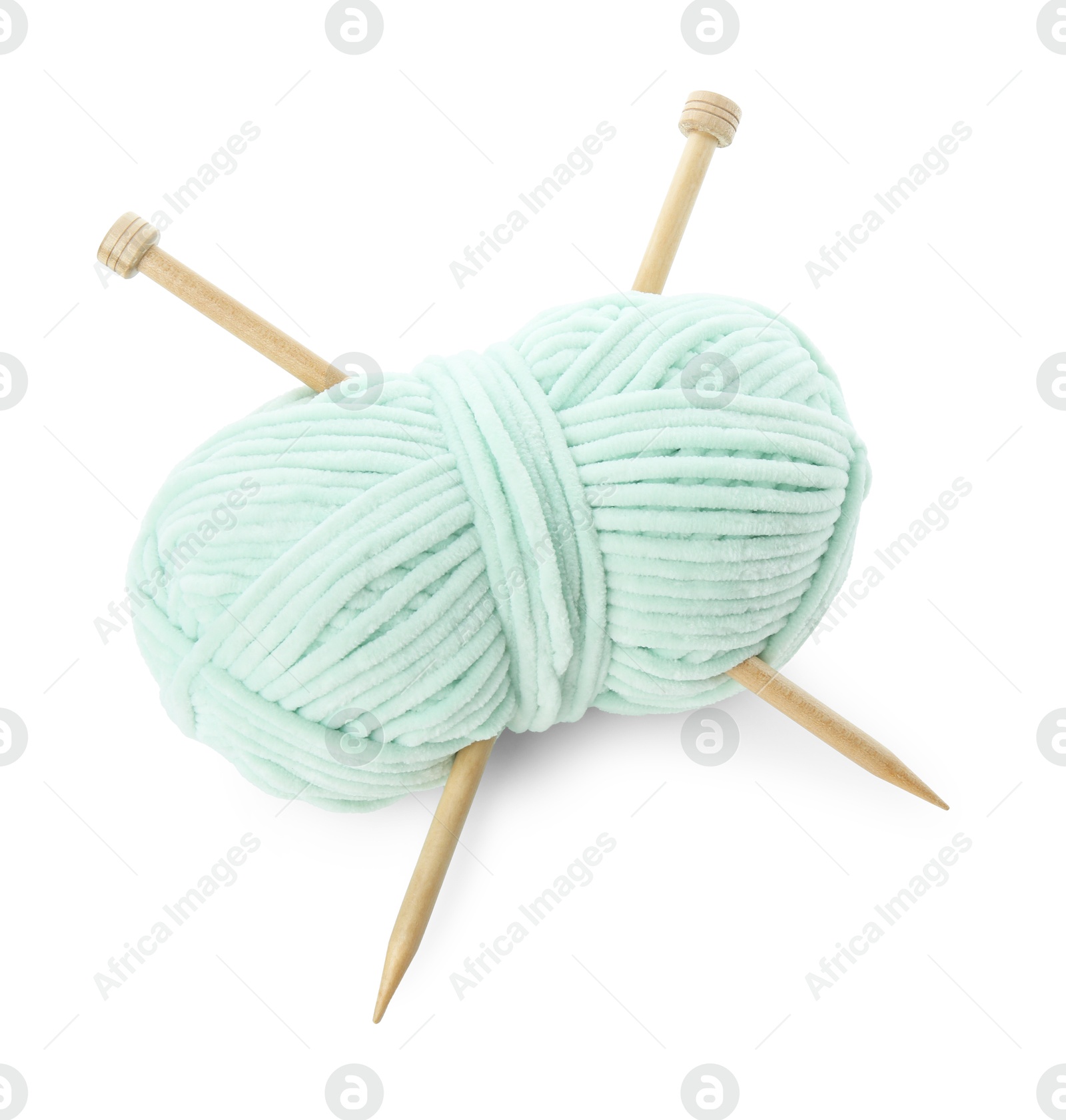 Photo of Skein of soft yarn and knitting needles isolated on white, above view